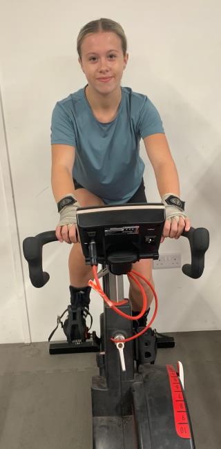 Malie working hard on the exercise bike